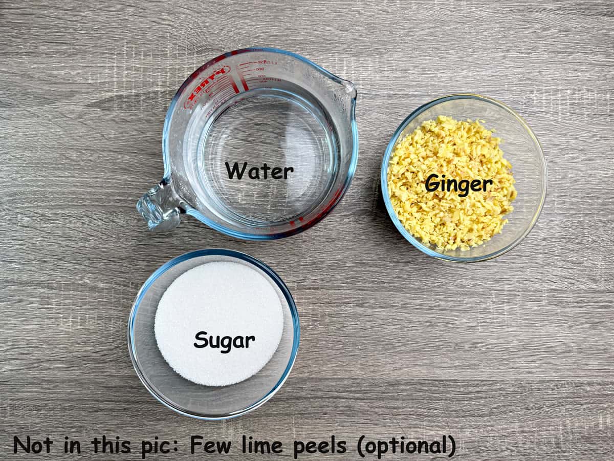Ingredients in individual glass bowl - water, ginger, and sugar.