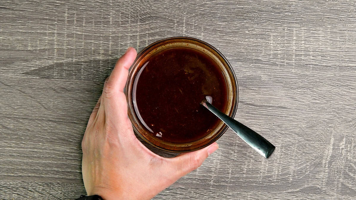 Glaze ingredients mixed together with a spoon.