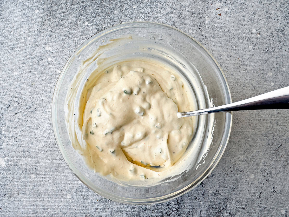 Top-down view of creamy dip ready to be chilled and then served.