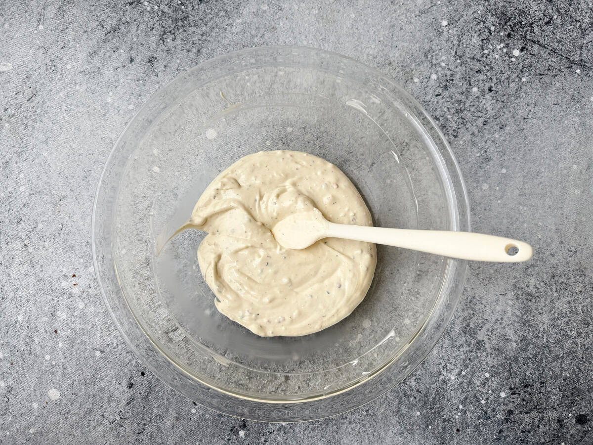 Ingredients mixed thoroughly for creamy mayo and sour cream sandwich dressing.