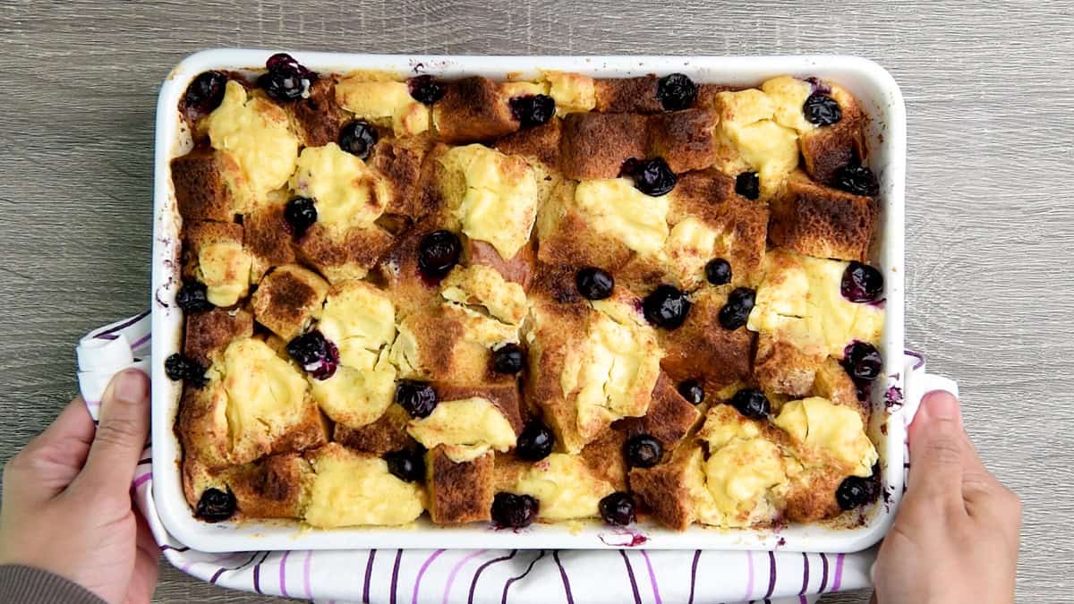 A 9x13 pan of overnight french toast casserole baked until slightly golden browned and ready to be served.
