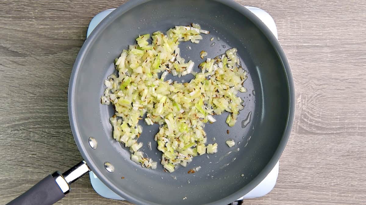Onion combined to the pan and cooked until its softened and lightly translucent.